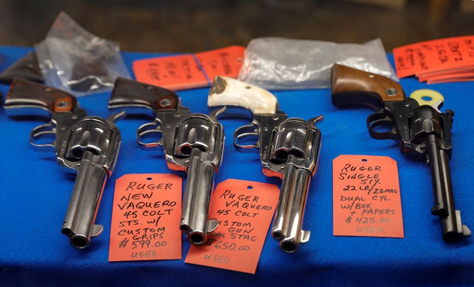 Guns are displayed in a case at Master Class Shooting Range in Monroe, New York, July 30, 2020. (CNS/Reuters/Brendan McDermid)