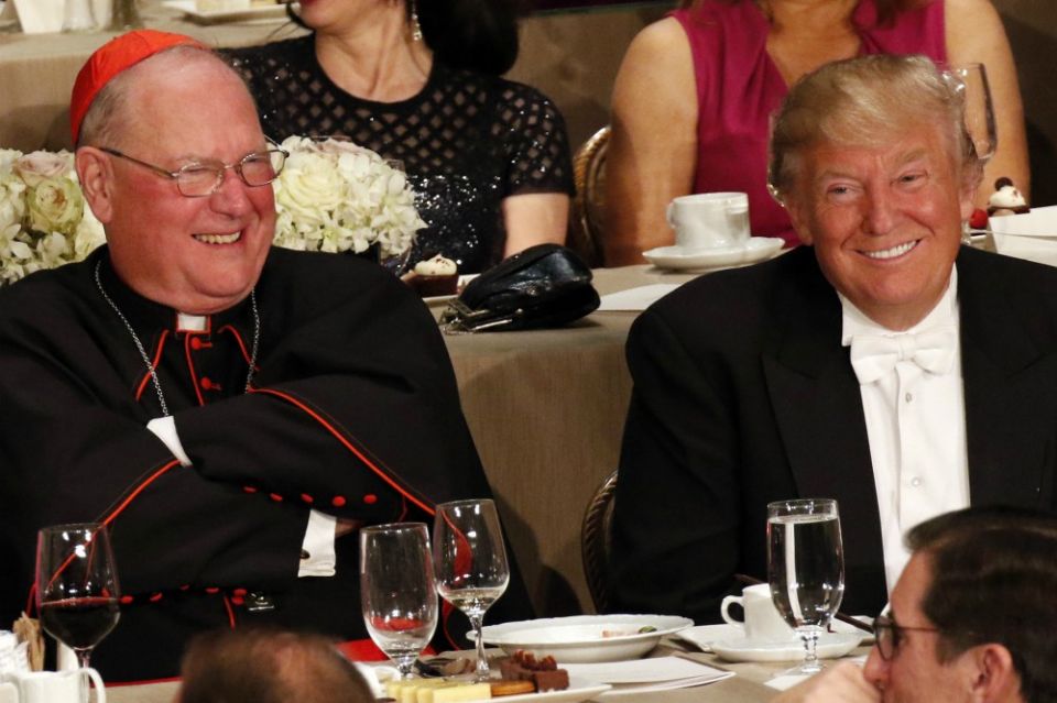 Cardinal Timothy Dolan and Donald Trump, then the Republican nominee for president, smile during the Alfred E. Smith Memorial Foundation Dinner in New York City Oct. 20, 2016. (CNS/Gregory A. Shemitz) Cardinal Timothy Dolan and Donald Trump, then the Republican nominee for president, smile during the Alfred E. Smith Memorial Foundation Dinner in New York City Oct. 20, 2016. (CNS/Gregory A. Shemitz)