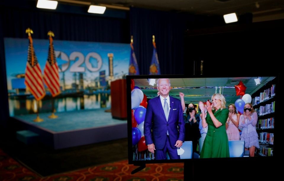 The Democratic presidential nominee, former Vice President Joe Biden, and his wife, Jill Biden, are seen in a video feed from Delaware after winning the votes to become the party's 2020 nominee for president Aug. 18. (CNS/Brian Snyder, Pool via Reuters) The Democratic presidential nominee, former Vice President Joe Biden, and his wife, Jill Biden, are seen in a video feed from Delaware after winning the votes to become the party's 2020 nominee for president Aug. 18. (CNS/Brian Snyder, Pool via Reuters)