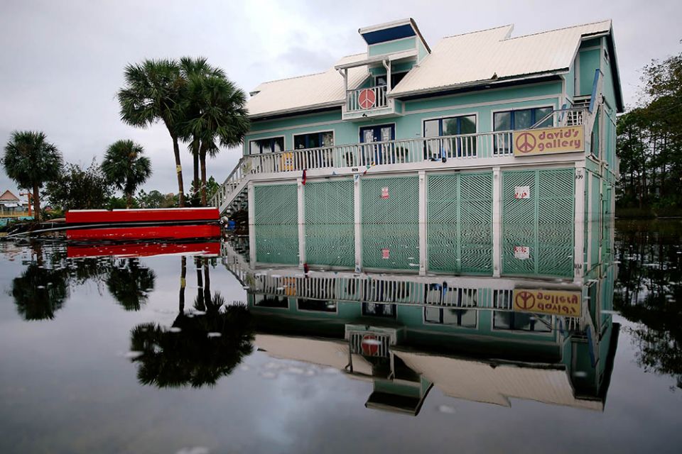 A house in Gulf Shores, Alabama, is surrounded by flood waters Sept. 17, 2020, after Hurricane Sally swept through the area. (CNS/Reuters/Jonathan Bachman)