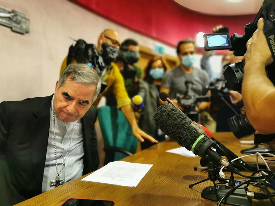 Cardinal Giovanni Angelo Becciu speaks with journalists during a media conference in Rome Sept. 25, 2020.