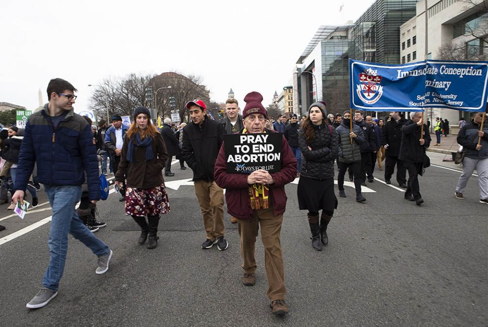 People walk up Constitution Avenue headed toward the U.S. Supreme Court Jan. 24, 2020, during the 47th annual March for Life in Washington. (CNS/Tyler Orsburn)