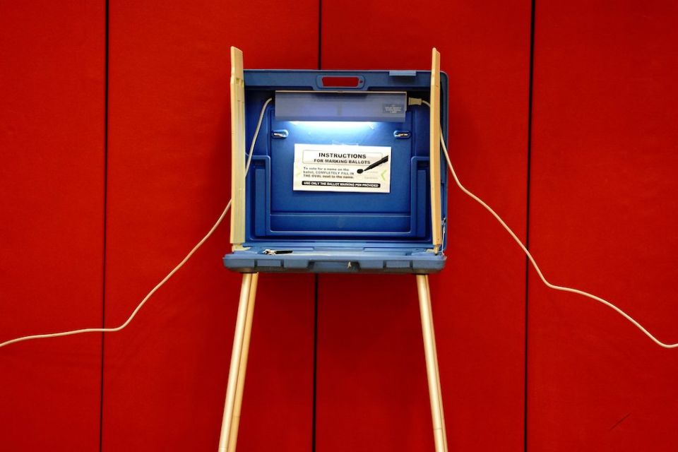 A voting booth is at a polling station inside Knapp Elementary School in Racine, Wis., on Election Day Nov. 3, 2020. (CNS/Bing Guan, Reuters)