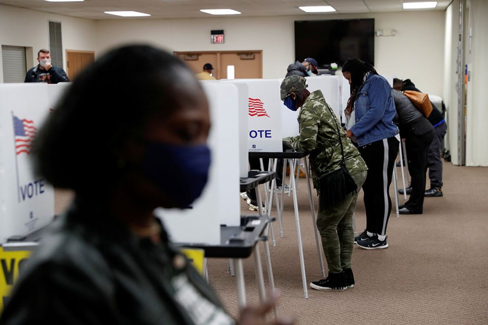 People vote at a polling station in Flint, Michigan, during the presidential election Nov. 3, 2020. (CNS/Reuters/Shannon Stapleton) People vote at a polling station in Flint, Michigan, during the presidential election Nov. 3, 2020. (CNS/Reuters/Shannon Stapleton)
