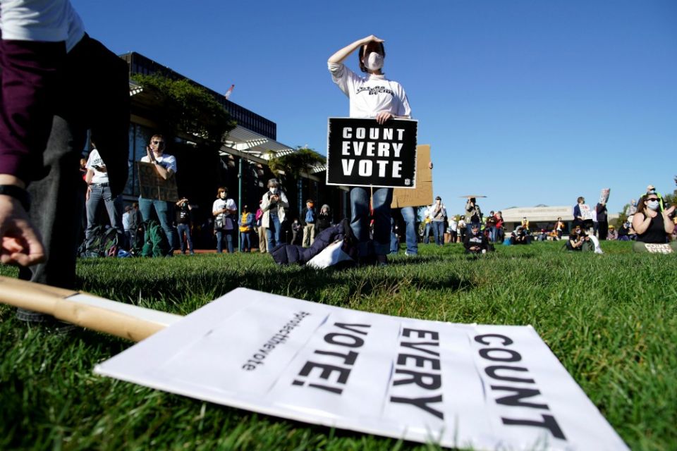 A woman holds a sign during a rally demanding a fair count of the votes of the presidential election in Philadelphia Nov. 4. (CNS/Reuters/Eduardo Munoz) A woman holds a sign during a rally demanding a fair count of the votes of the presidential election in Philadelphia Nov. 4. (CNS/Reuters/Eduardo Munoz)