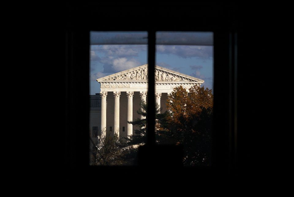 The Supreme Court building is seen through a window in Washington Nov. 10, 2020. The U.S. Supreme Court is now deliberating over Fulton v. City of Philadelphia. (CNS/Hannah McKay, Reuters)