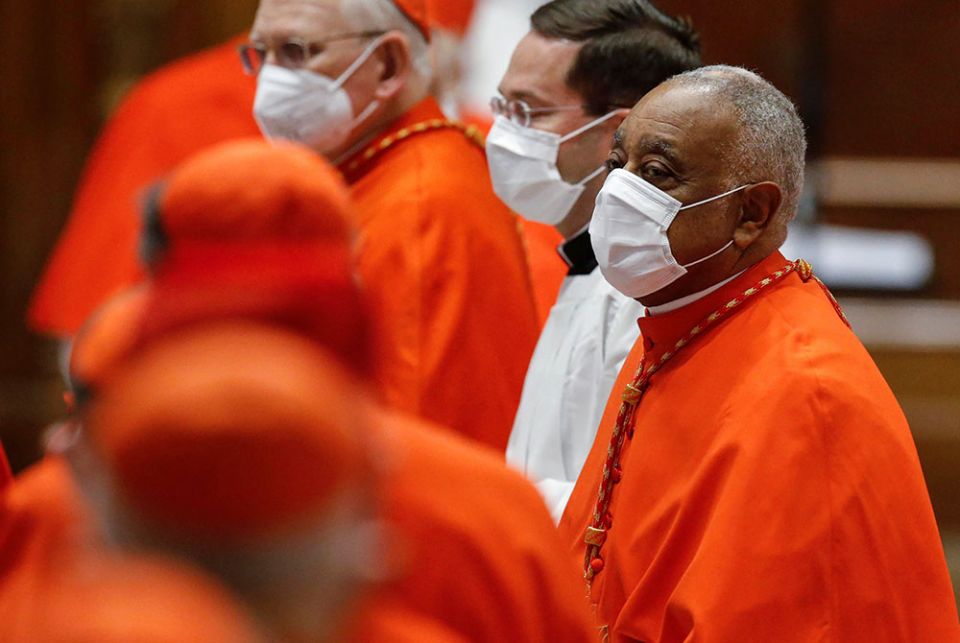 Cardinal Wilton Gregory of Washington wears a protective mask as he attends a consistory led by Pope Francis in St. Peter's Basilica Nov. 28 at the Vatican. Gregory was among 13 new cardinals created by the pope. (CNS/Fabio Frustaci, Reuters pool) Cardinal Wilton Gregory of Washington wears a protective mask as he attends a consistory led by Pope Francis in St. Peter's Basilica Nov. 28 at the Vatican. Gregory was among 13 new cardinals created by the pope. (CNS/Fabio Frustaci, Reuters pool)