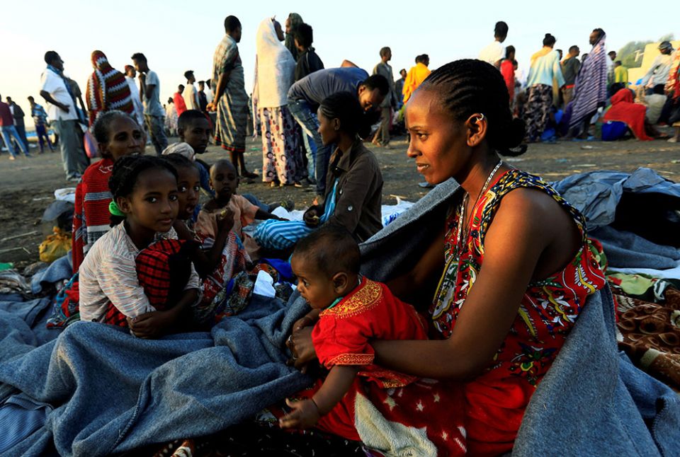 Ethiopian women who fled the ongoing fighting in the Tigray region of Ethiopia are seen in Sudan Nov. 22, 2020. (CNS/Reuters/Mohamed Nureldin Abdallah)