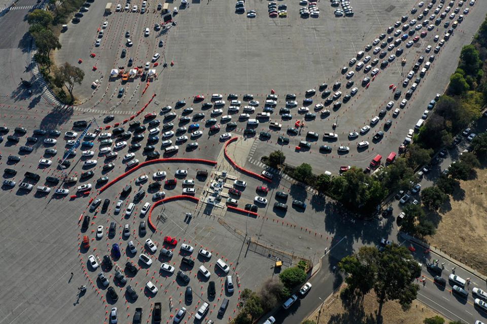 People in Los Angeles line up in their vehicles at Dodger Stadium for the COVID-19 test Jan. 4. (CNS/Reuters/Lucy Nicholson) People in Los Angeles line up in their vehicles at Dodger Stadium for the COVID-19 test Jan. 4. (CNS/Reuters/Lucy Nicholson)