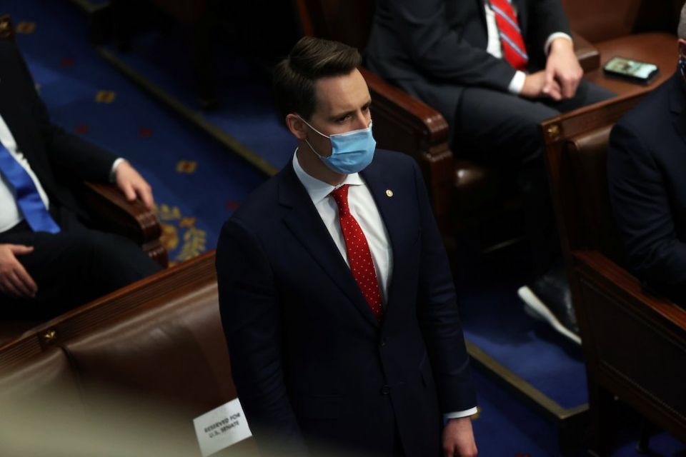 Sen. Josh Hawley, R-Mo., stands to object to the Pennsylvania Electoral College vote a joint session of Congress in Washington Jan. 6. (CNS/Reuters/Jonathan Ernst)