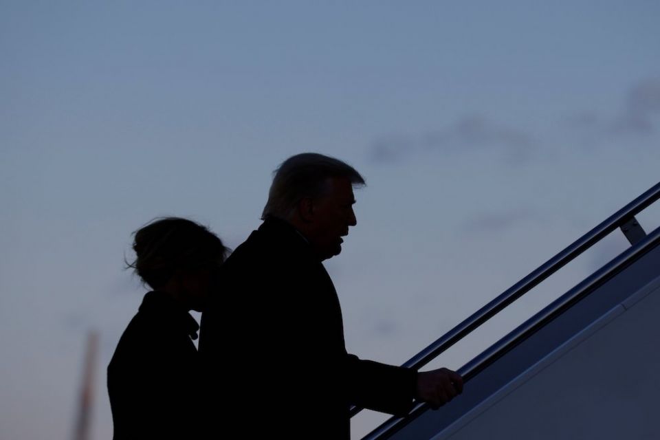 Then-President Donald Trump and first lady Melania Trump depart Joint Base Andrews in Maryland Jan. 20, ahead of then-President-elect Joe Biden's inauguration. (CNS/Carlos Barria, Reuters)