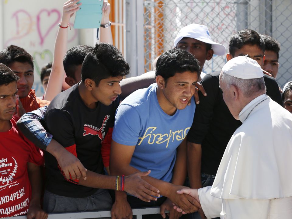 Pope Francis meets refugees at the Moria refugee camp on the island of Lesbos, Greece, in this April 16, 2016, file photo. (CNS photo/Paul Haring)