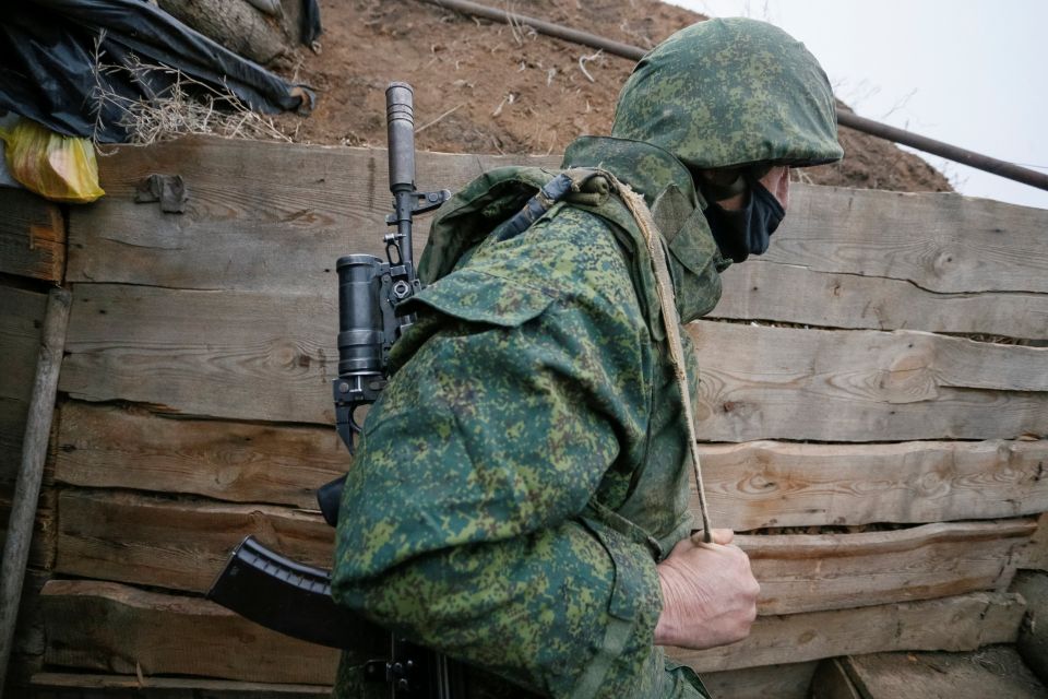 A militant of the separatist Donetsk People's Republic is seen at frontline positions located on the troops contact line with Ukrainian forces near the Ukrainian village of Leninsko Dec. 18, 2020.(CNS photo/Alexander Ermochenko, Reuters)
