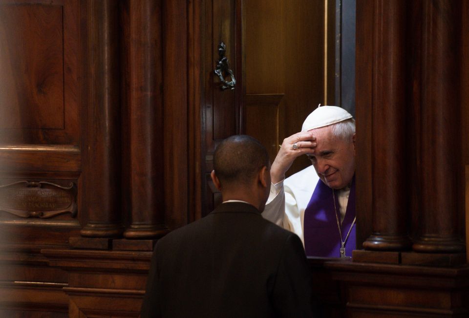 Pope Francis hears the confession of a priest at the Basilica of St. John Lateran in Rome, March 7, 2019. (CNS photo/Vatican Media)