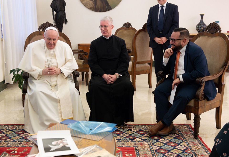 Pope Francis meets with members of the Catholic News Service Rome bureau at the Domus Sanctae Marthae at the Vatican Feb. 1, 2021. (CNS/Vatican Media)