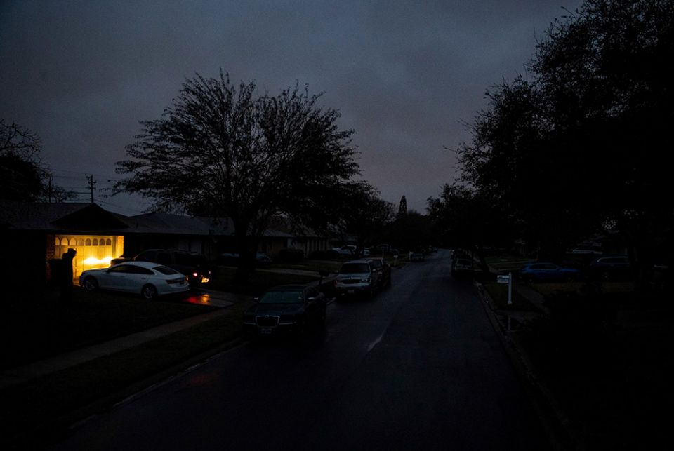 A car in Corpus Christi, Texas, idles Feb. 17 in a neighborhood that has no electricity. (CNS/Courtney Sacco, Caller-Times, USA Today Network via Reuters) A car in Corpus Christi, Texas, idles Feb. 17 in a neighborhood that has no electricity. (CNS/Courtney Sacco, Caller-Times, USA Today Network via Reuters)