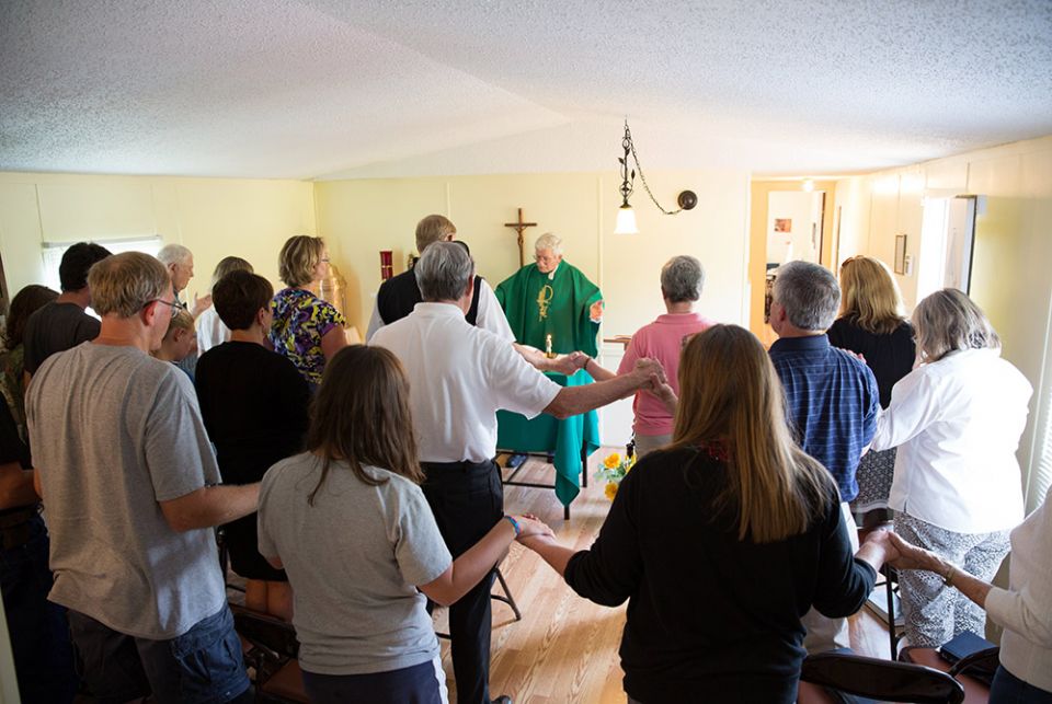 In this 2013 file photo, Mass is celebrated at St. Luke's Church in Salyersville, Kentucky, a parish in the Diocese of Lexington that is supported by Catholic Extension. The majority of the counties within the diocese are rural and in mountain areas where In this 2013 file photo, Mass is celebrated at St. Luke's Church in Salyersville, Kentucky, a parish in the Diocese of Lexington that is supported by Catholic Extension. The majority of the counties within the diocese are rural and in mountain areas where