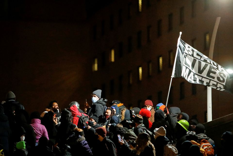 People in Rochester, New York, react Feb. 23, after a New York grand jury voted not to indict police officers in Daniel Prude's death. Prude, a Black man, died after police put a spit hood over his head during an arrest March 23, 2020. (CNS/Lindsay DeDari People in Rochester, New York, react Feb. 23, after a New York grand jury voted not to indict police officers in Daniel Prude's death. Prude, a Black man, died after police put a spit hood over his head during an arrest March 23, 2020. (CNS/Lindsay DeDari