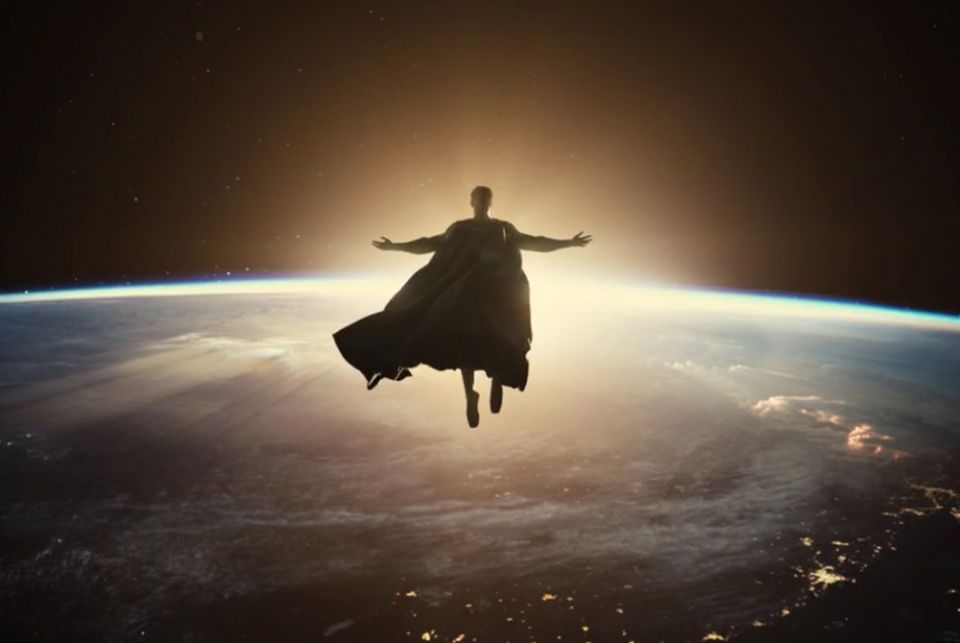 Superman, played by Henry Cavill, soars above the Earth in a scene from the movie, "Justice League," by director Zack Snyder. Bishop Paul Tighe, secretary of the Pontifical Council for Culture, told Catholic News Service that Snyder's use of religious ima