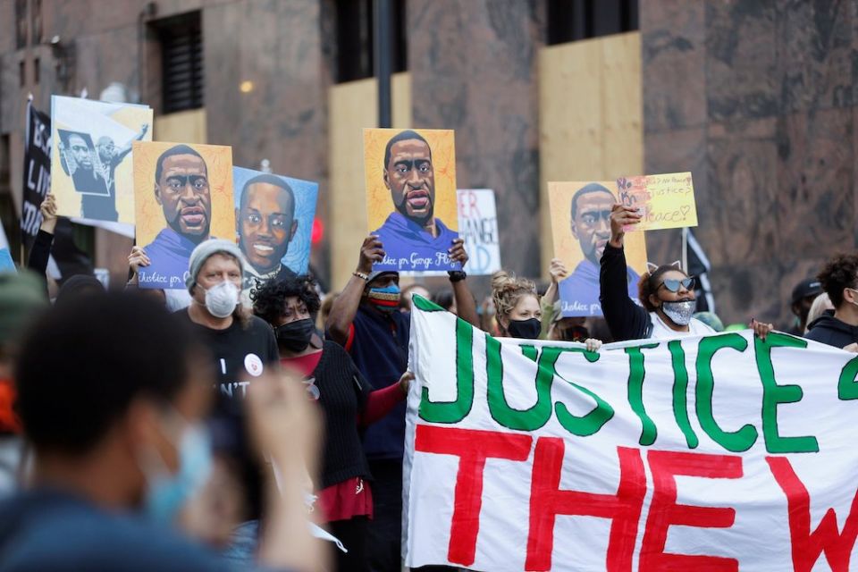 Demonstrators in Minneapolis march on the first day of the trial of former police officer Derek Chauvin March 29. (CNS/Reuters/Octavio Jones) Demonstrators in Minneapolis march on the first day of the trial of former police officer Derek Chauvin March 29. (CNS/Reuters/Octavio Jones)