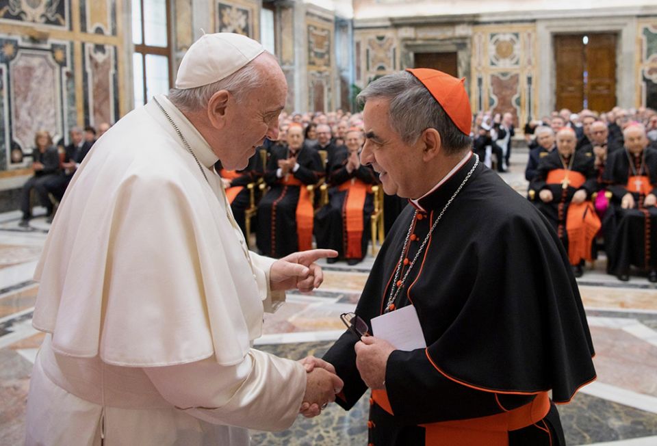 Pope Francis greets Cardinal Giovanni Angelo Becciu, then prefect of the Congregation for Saints' Causes, at the Vatican Dec. 16, 2019. (CNS/Vatican Media)