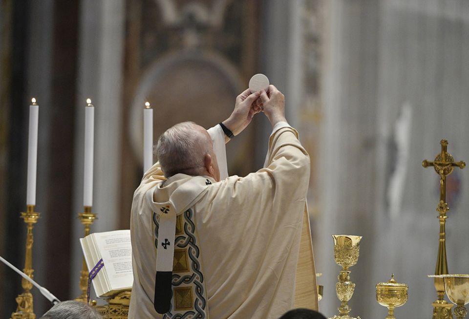 Pope Francis elevates the Eucharist during Easter Mass in St. Peter's Basilica at the Vatican April 4. (CNS/Vatican Media) Pope Francis elevates the Eucharist during Easter Mass in St. Peter's Basilica at the Vatican April 4. (CNS/Vatican Media)