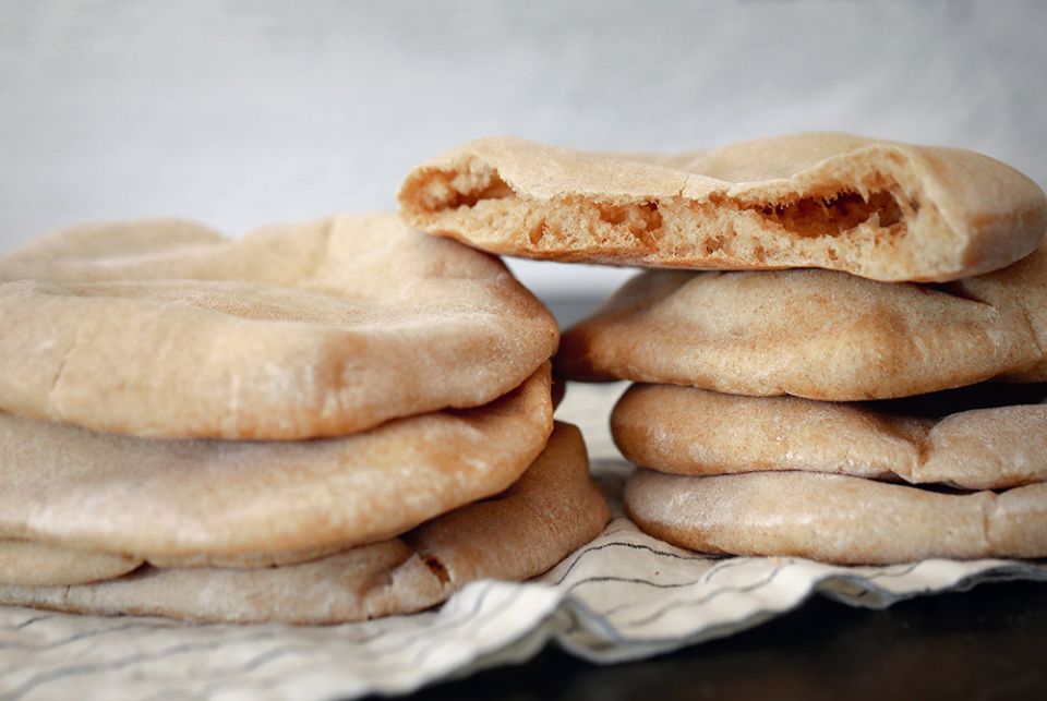 A leavened flatbread akin to pita has been made in the Middle East since before the time of Christ. (CNS/Nancy Wiechec)
