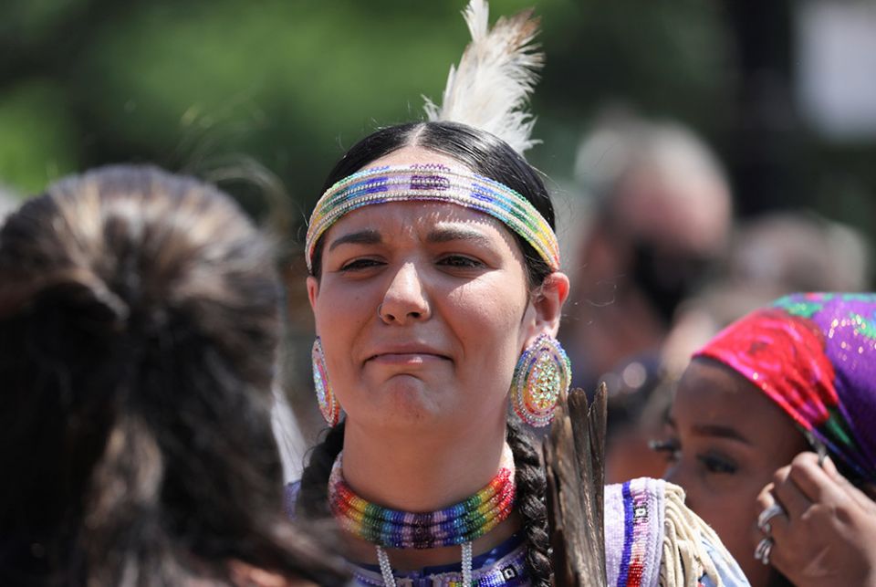 A protester takes part in a march from the Ontario provincial legislature in Toronto, Ontario, June 6, after the remains of 215 children were found on the grounds of the Kamloops Indian Residential School in May. For years Indigenous people in Canada have