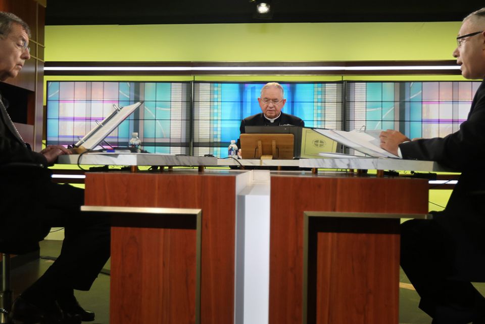 Msgr. Jeffrey Burrill, general secretary of the U.S. Conference of Catholic Bishops, right, reads a message to Pope Francis June 16, at the bishops' conference headquarters in Washington on the opening day of the bishops' three-day virtual spring meeting. Msgr. Jeffrey Burrill, general secretary of the U.S. Conference of Catholic Bishops, right, reads a message to Pope Francis June 16, at the bishops' conference headquarters in Washington on the opening day of the bishops' three-day virtual spring meeting.