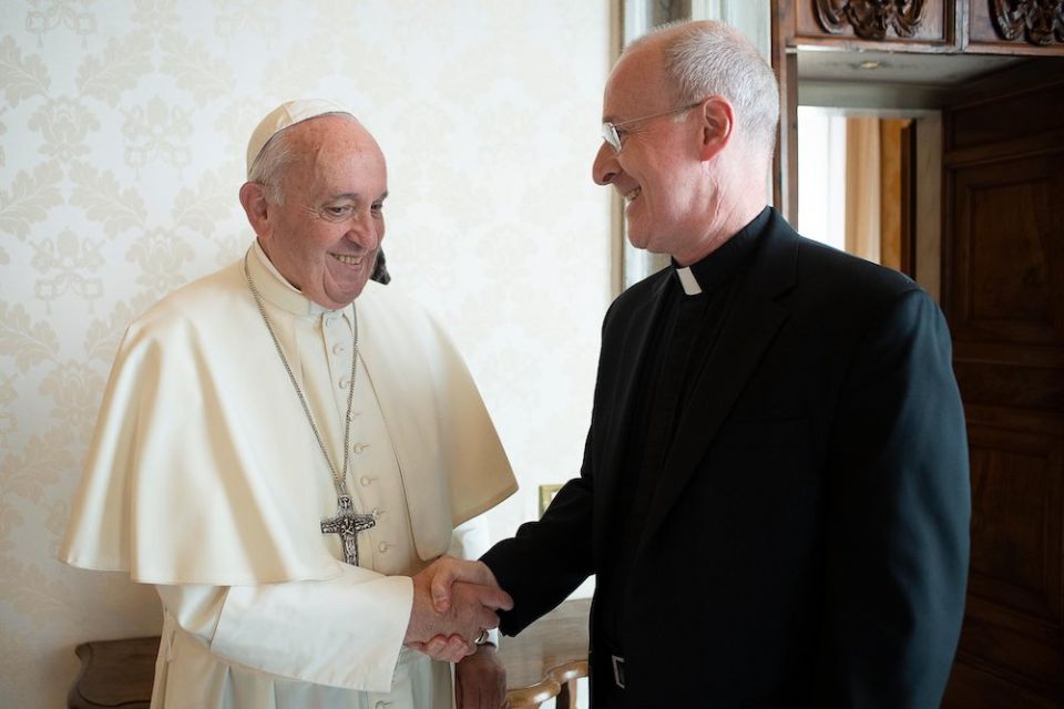 Pope Francis greets Jesuit Fr. James Martin, author and editor at large of America magazine, during a private meeting at the Vatican in this Oct. 1, 2019, file photo. Martin released a recent handwritten letter from the pope that commended his LGBT minist Pope Francis greets Jesuit Fr. James Martin, author and editor at large of America magazine, during a private meeting at the Vatican in this Oct. 1, 2019, file photo. Martin released a recent handwritten letter from the pope that commended his LGBT minist