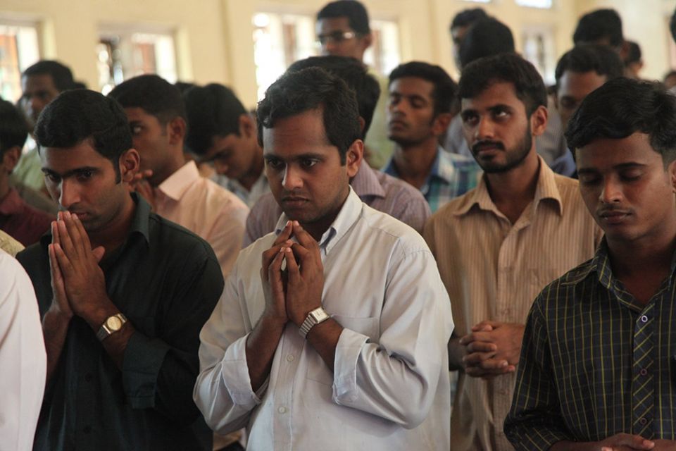 Seminarians pray at St. Joseph Pontifical Seminary of the Syro-Malabar Catholic Church in India's Kerala state. (CNS/Courtesy of CNEWA/Msgr. John E. Kozar)