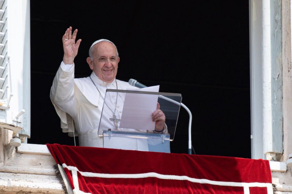 Pope Francis greets the crowd gathered in St. Peter's Square at the Vatican for the midday recitation of the Angelus July 4. After speaking about the day's Gospel reading and leading the prayer, Pope Francis went to Rome's Gemelli hospital for colon surge