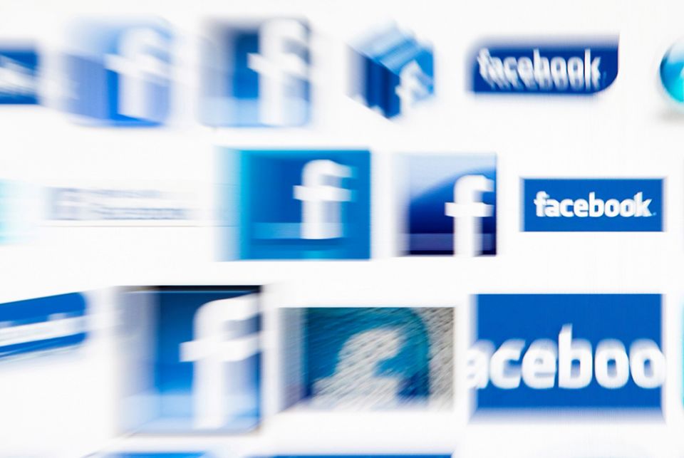 Facebook logos on a computer screen are seen in this illustration photo. (CNS/Reuters/Valentin Flauraud)