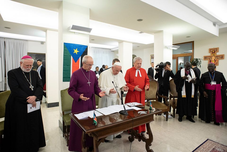 Pope Francis prays alongside Archbishop Paul Gallagher, the Vatican's foreign minister, Anglican Archbishop Justin Welby of Canterbury, and the Rev. John Chalmers, former moderator of the Presbyterian Church of Scotland, April 11, 2019, at the conclusion 