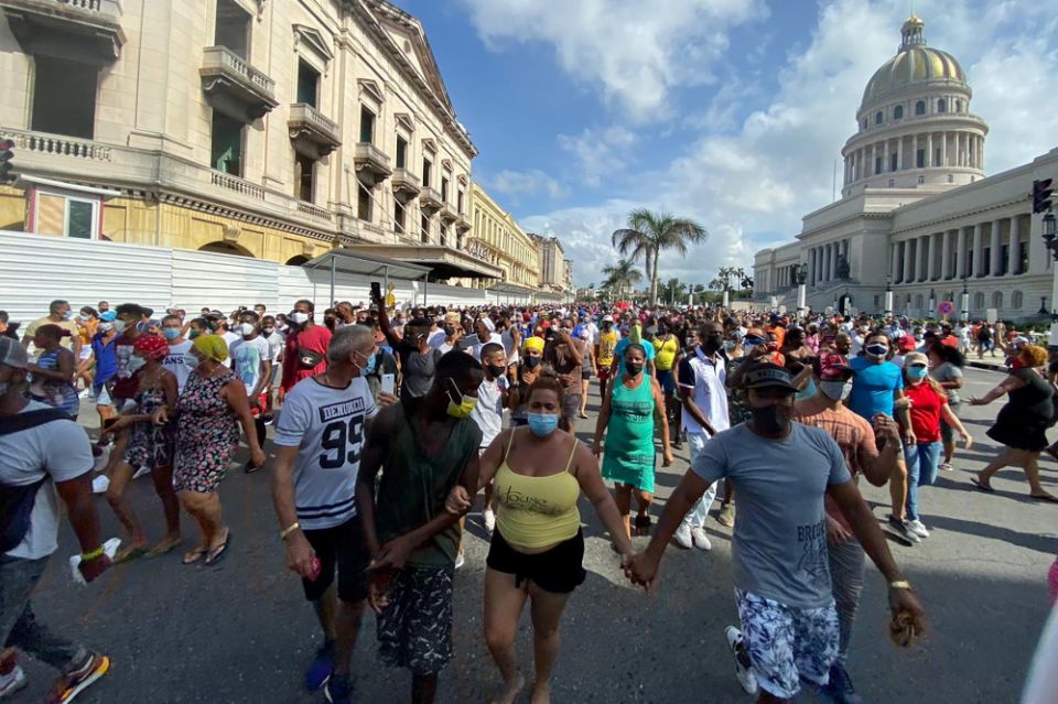 People participate in demonstrations in Havana July 11. 