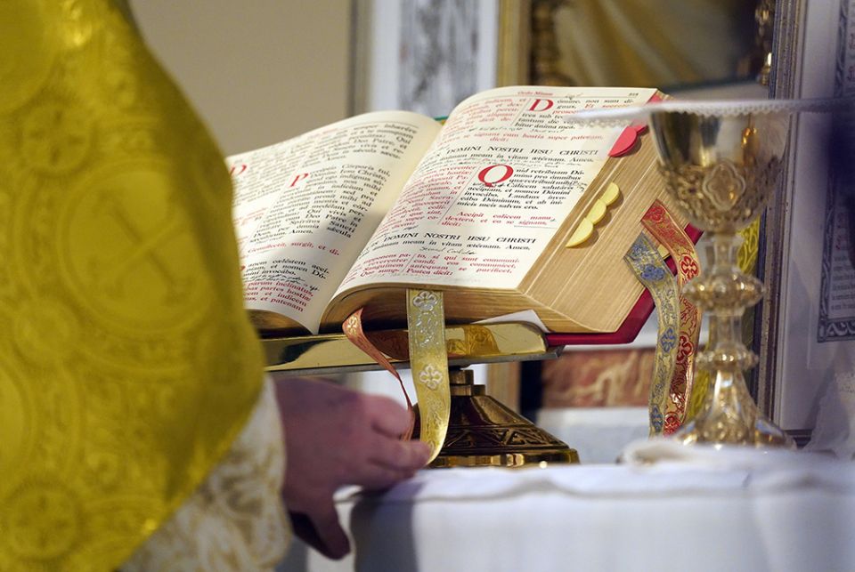 A sacramentary is seen on the altar during a traditional Tridentine Mass July 18, at St. Josaphat Church in the Queens borough of New York City. (CNS/Gregory A. Shemitz)