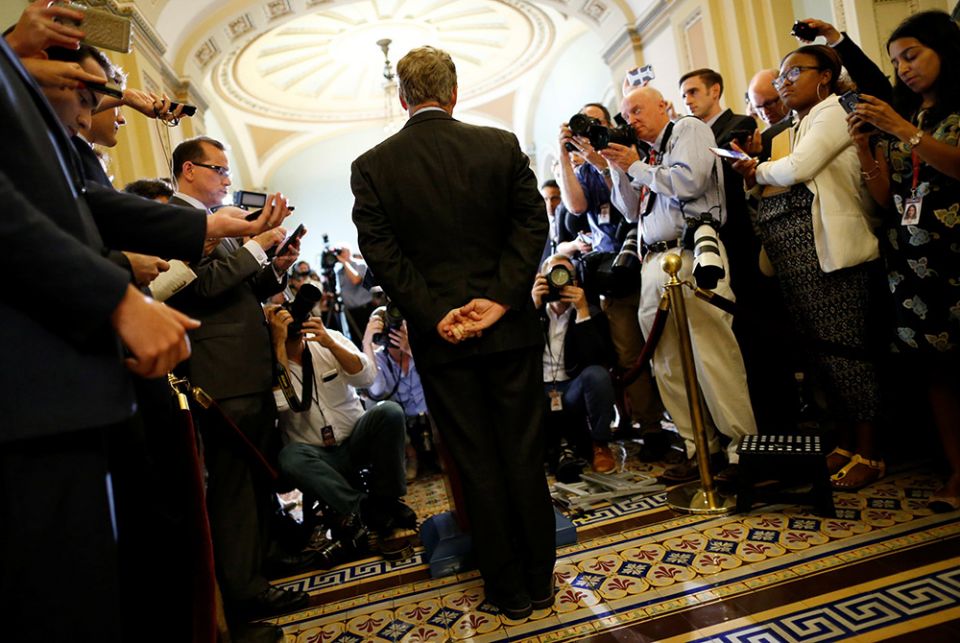 Journalists interview a U.S. senator in this illustration photo. (CNS/Reuters/Jonathan Ernst)