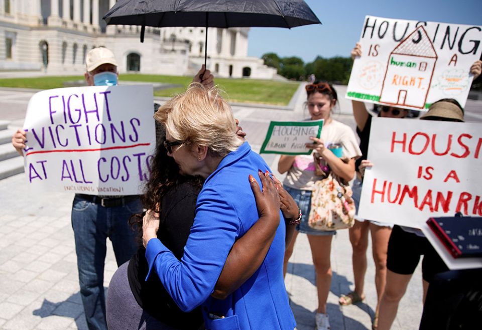U.S. Rep. Cori Bush and U.S. Sen. Elizabeth Warren embrace July 31, 2021, in front of the U.S. Capitol in Washington. Bush spent the night there to highlight the midnight expiration of a pandemic-related federal moratorium on residential evictions. (CNS) U.S. Rep. Cori Bush and U.S. Sen. Elizabeth Warren embrace July 31, 2021, in front of the U.S. Capitol in Washington. Bush spent the night there to highlight the midnight expiration of a pandemic-related federal moratorium on residential evictions. (CNS)