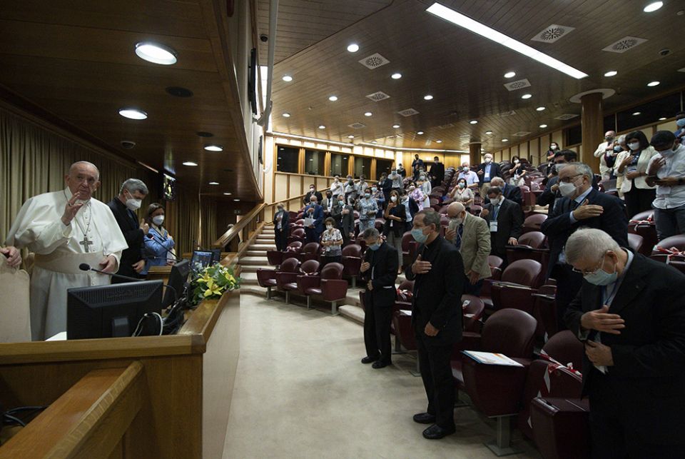Pope Francis gives his blessing Sept. 16 at the end of a meeting in the Vatican synod hall Pope Francis gives his blessing Sept. 16 at the end of a meeting in the Vatican synod hall with members of lay movements. The hall will be the site of the 2023 Vatican event, the final phase of the new process of the Synod of Bishops (CNS/Vatican Media)