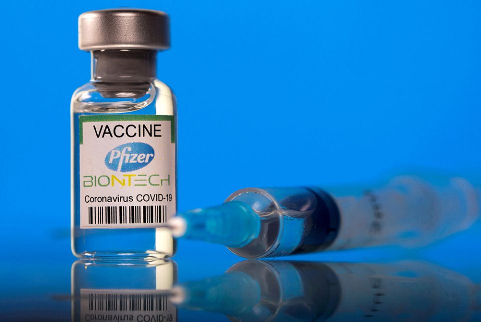 A vial labeled with the Pfizer-BioNTech COVID-19 vaccine A vial labeled with the Pfizer-BioNTech COVID-19 vaccine is seen in this illustration photo. (CNS/Reuters/Dado Ruvic)
