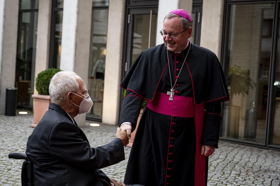 Bishop Georg Bätzing, president of the German bishops' conference, welcomes Wolfgang Schäuble, president of the Bundestag, the German federal parliament, at the annual St. Michael's reception in Berlin Sept. 27, 2021. In an address at the conference, Bish