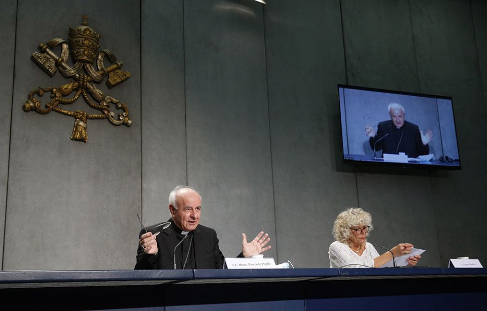 Archbishop Vincenzo Paglia, president of the Pontifical Academy for Life, speaks at a news conference at the Vatican Sept. 28. Also pictured is Cristiane Murray, vice director of the Vatican Press Office. (CNS/Paul Haring)