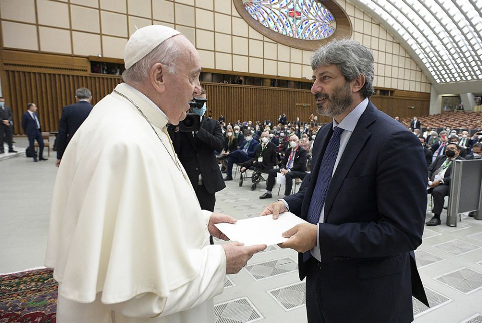 Pope Francis greets Roberto Fico, president of the Italian Chamber of Deputies, during a meeting of legislators at the Vatican Oct. 9 in advance of the U.N. climate summit in Glasgow. (CNS/Vatican Media)