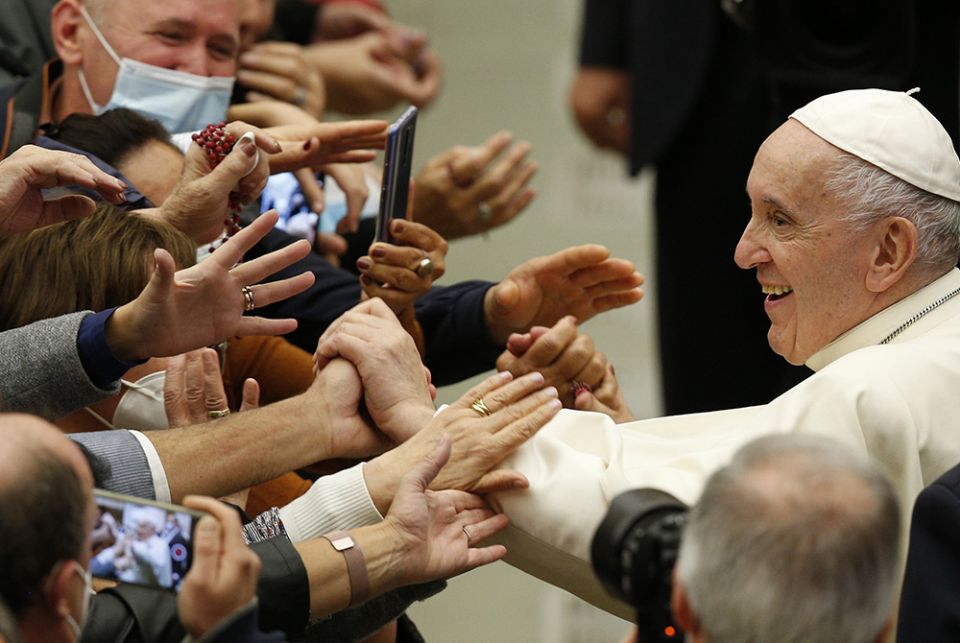 Pope Francis greets people during his general audience in the Paul VI hall Oct. 13 at the Vatican. (CNS/Paul Haring) Pope Francis greets people during his general audience in the Paul VI hall Oct. 13 at the Vatican. (CNS/Paul Haring)