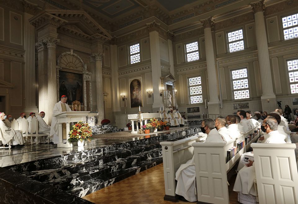 Cardinal Blase Cupich of Chicago reads a letter from Pope Francis at the beginning of Mass in the Chapel of the Immaculate Conception at Mundelein Seminary Oct. 17. (CNS/Chicago Catholic/Karen Callaway)