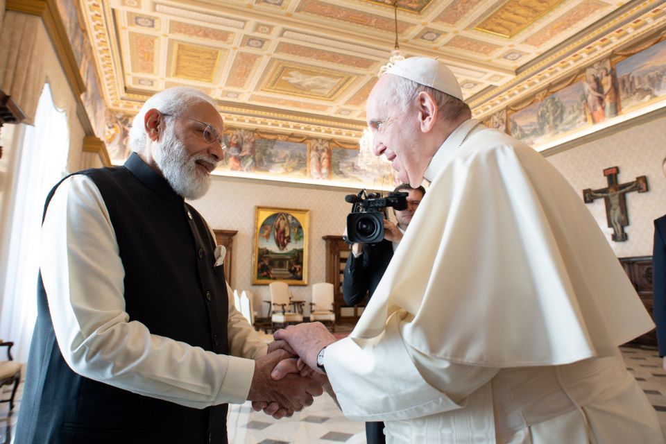 Pope Francis shakes hands with Indian Prime Minister Narendra Modi during a meeting at the Vatican Oct. 30, 2021. (CNS photo/Vatican Media)