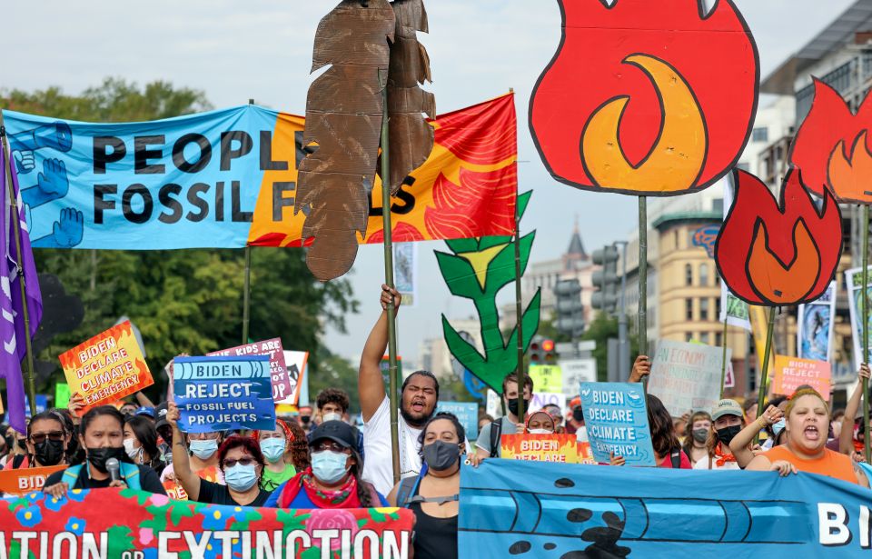 Young environmental activists march to the U.S. Capitol during a climate change protest in Washington, D.C., Oct. 15, 2021. Members of Gen Z, people born after 1996, generally consider climate change an existential crisis. (CNS/Reuters/Evelyn Hockstein)