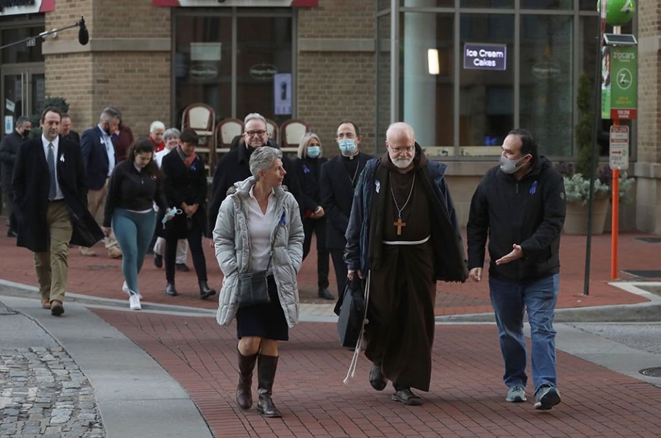 Cardinal Sean O'Malley of Boston, president of the Pontifical Commission for the Protection of Minors, joins a sunrise walk to end abuse Nov. 18 in Baltimore. (CNS/Bob Roller)