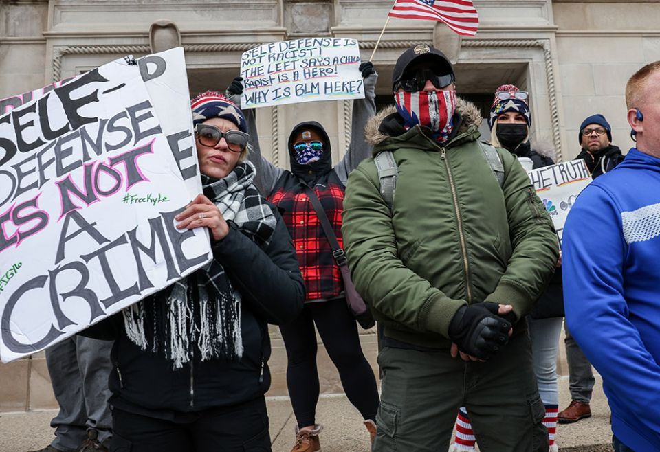 Protesters in Kenosha, Wisconsin, demonstrate outside of the Kenosha County Courthouse Nov. 16, as the jury deliberated in the trial of Kyle Rittenhouse. (CNS/Reuters/Evelyn Hockstein)
