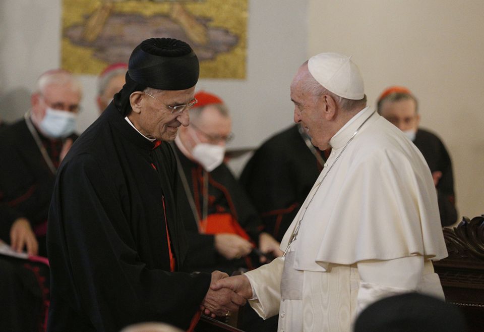 Cardinal Bechara Rai greets Pope Francis as the pope arrives to lead a meeting with priests, religious, deacons, catechists and members of church groups and movements at the Maronite Cathedral of Our Lady of Grace Dec. 2, 2021, in Nicosia, Cyprus. (CNS)